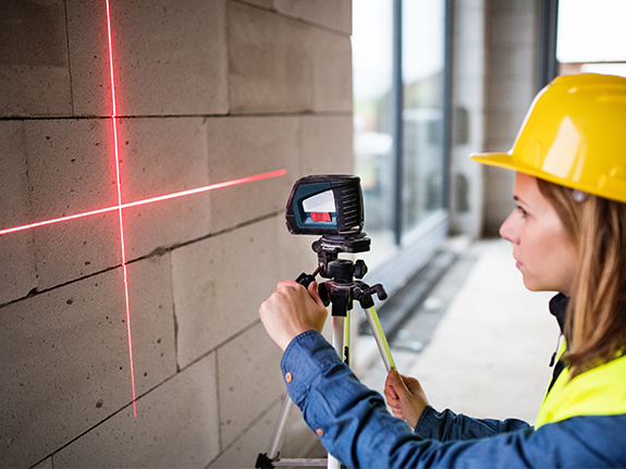 Electronic distance measurement in surveying