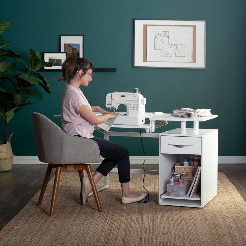 Photograph of Studio Designs Sew Ready Pro Line Sewing Machine and Office Desk with Fold-Down Top, Height Adjustable Platform, Drawer and Storage Cabinet with Slide-Out Shelf in White - 13397